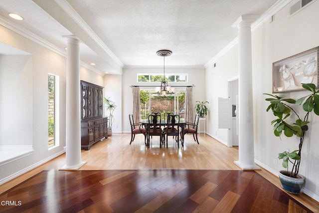 1590 Frazier St, Camarillo, CA 93012 - dining room with decorative columns, light wood-style floors, ornamental molding, a chandelier, and recessed lighting