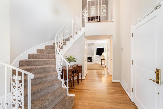 1590 Frazier St, Camarillo, CA 93012 - entrance foyer with wood finished floors, stairs, and a towering ceiling
