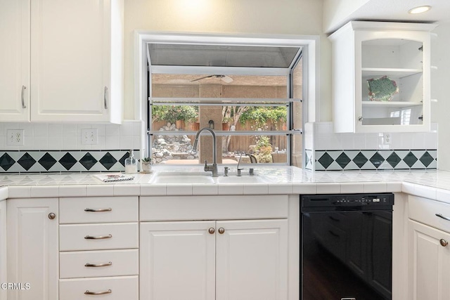 1590 Frazier St, Camarillo, CA 93012 - kitchen featuring white cabinetry, glass insert cabinets, tasteful backsplash, tile counters, and dishwasher