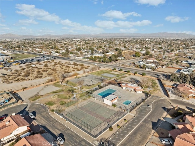 birds eye view of property featuring a mountain view