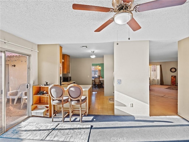 dining room with a textured ceiling