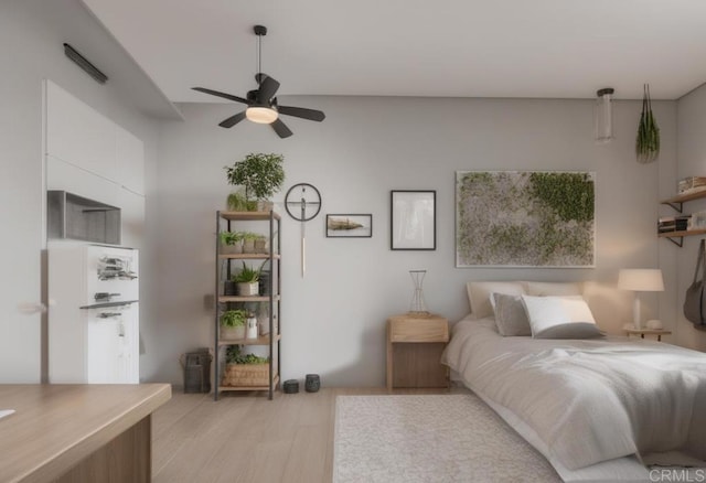 bedroom featuring light hardwood / wood-style floors and ceiling fan