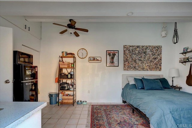 tiled bedroom with ceiling fan