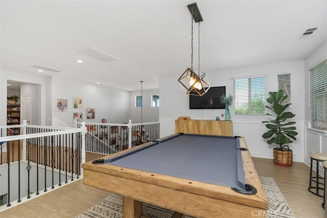 game room featuring wood-type flooring and billiards