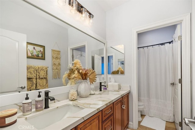 full bathroom featuring toilet, vanity, and shower / tub combo with curtain