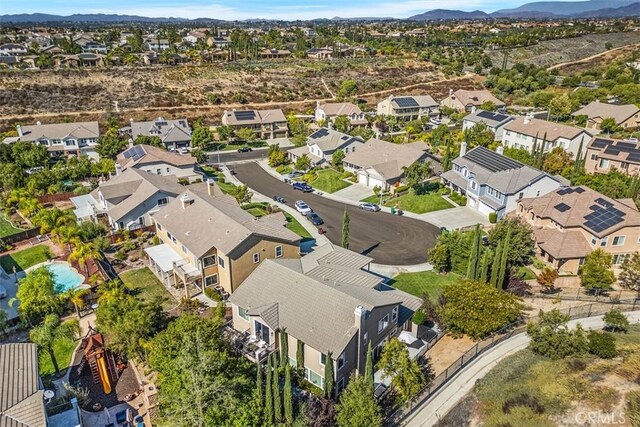 drone / aerial view featuring a mountain view