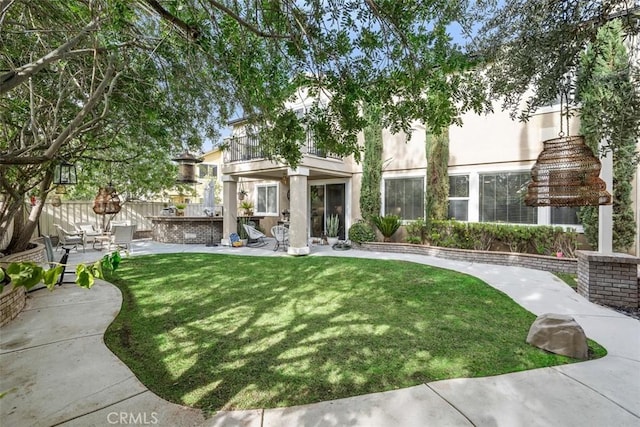 exterior space with a yard and a patio