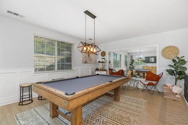 recreation room with billiards and light wood-type flooring