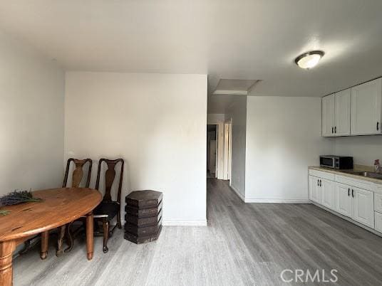 interior space featuring sink and hardwood / wood-style floors