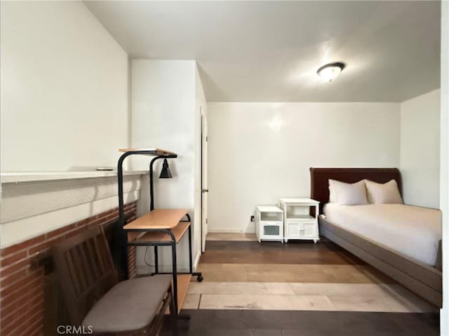 bedroom featuring hardwood / wood-style floors