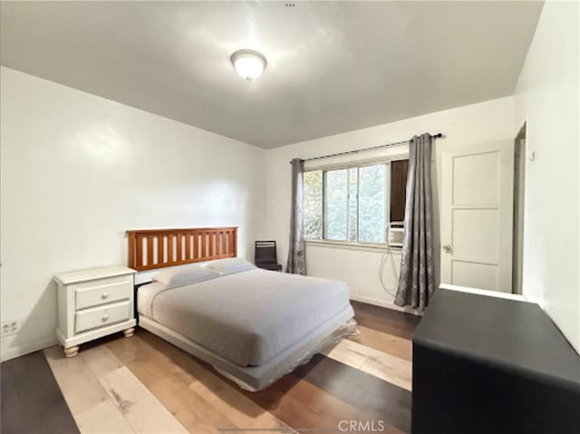 bedroom with light hardwood / wood-style flooring