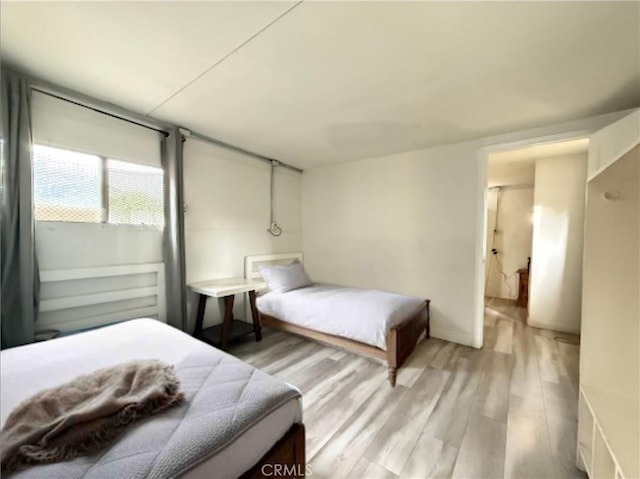 bedroom featuring light hardwood / wood-style flooring