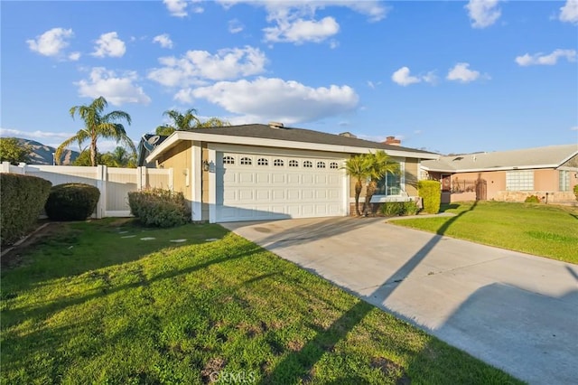 ranch-style house featuring a garage and a front lawn