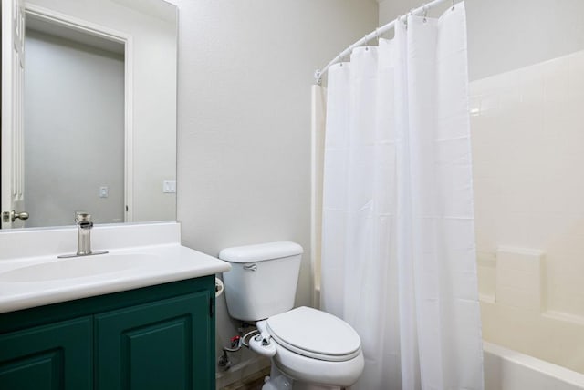 full bathroom featuring toilet, shower / bath combination with curtain, and vanity