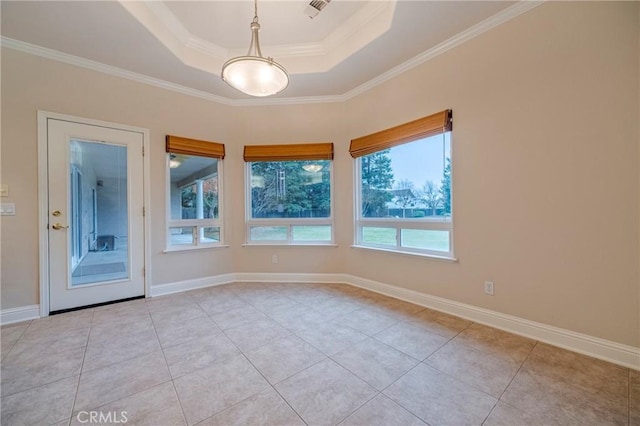 unfurnished room with a raised ceiling, light tile patterned floors, and crown molding