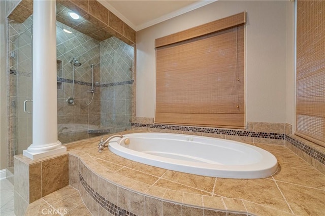 bathroom featuring independent shower and bath, ornamental molding, and decorative columns