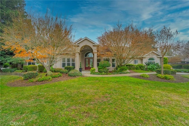 view of front facade with a front lawn