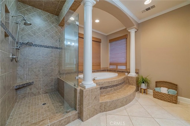 bathroom featuring tile patterned flooring, crown molding, plus walk in shower, and decorative columns