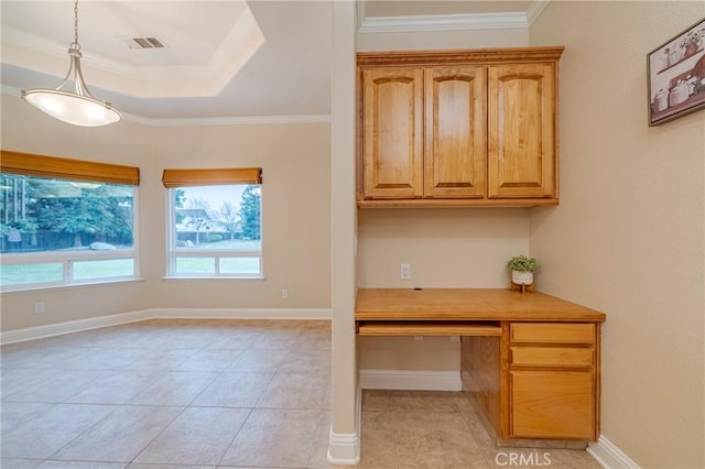 unfurnished office with a raised ceiling, crown molding, and light tile patterned flooring