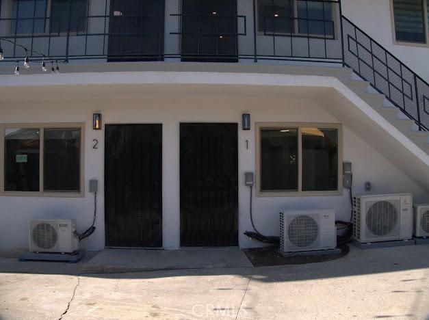 entrance to property with ac unit