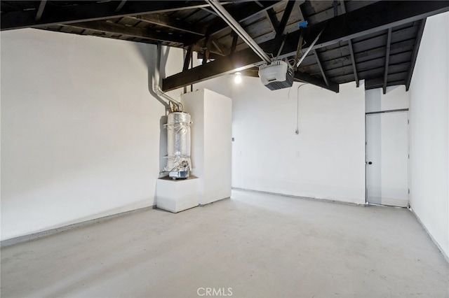 garage with a garage door opener and gas water heater