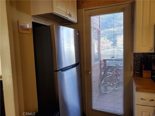 kitchen featuring stainless steel fridge