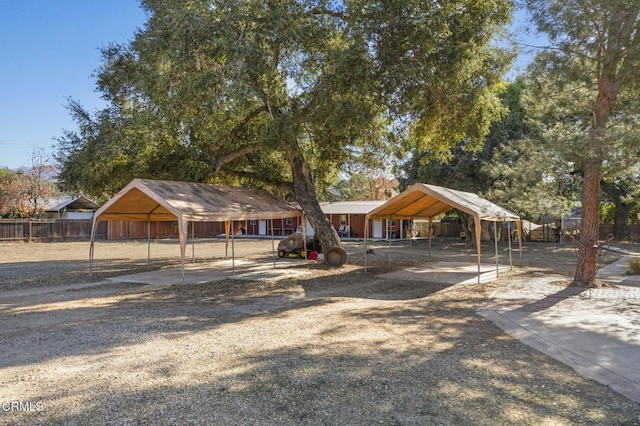 exterior space with a carport