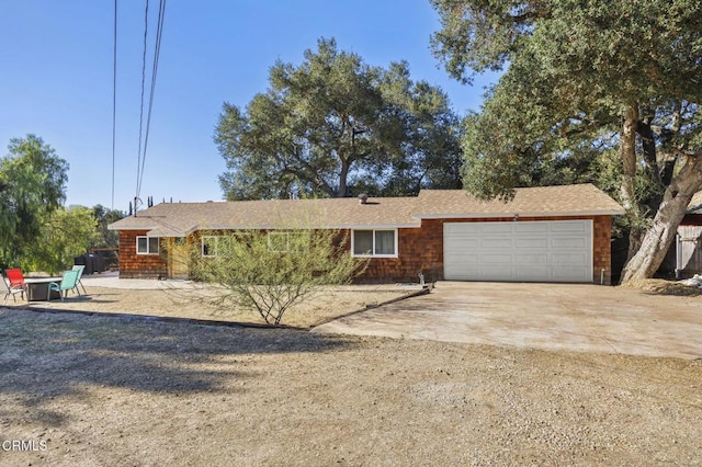 single story home with a garage