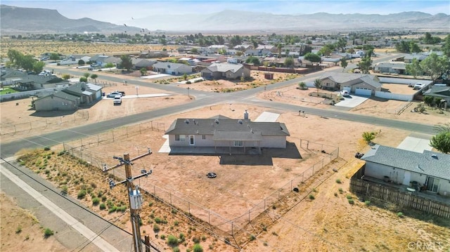 drone / aerial view featuring a mountain view