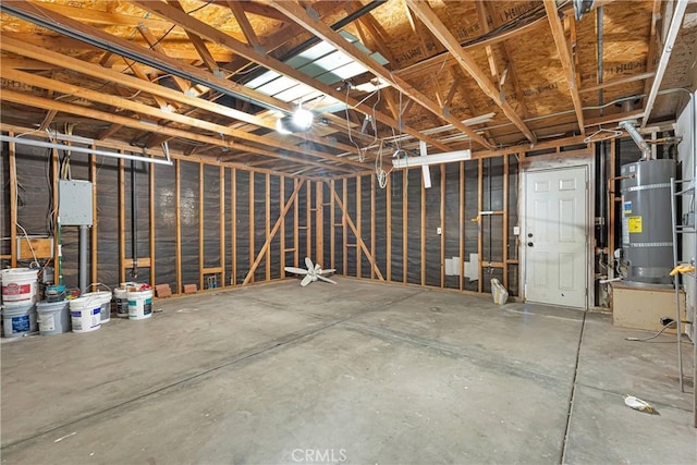 garage featuring strapped water heater