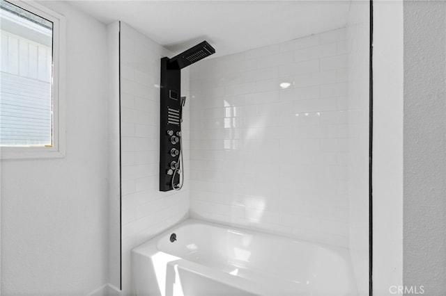 bathroom with shower / bathtub combination