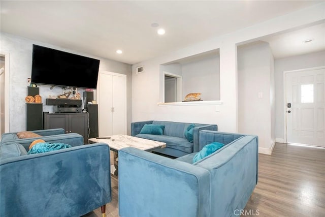 living room featuring hardwood / wood-style floors