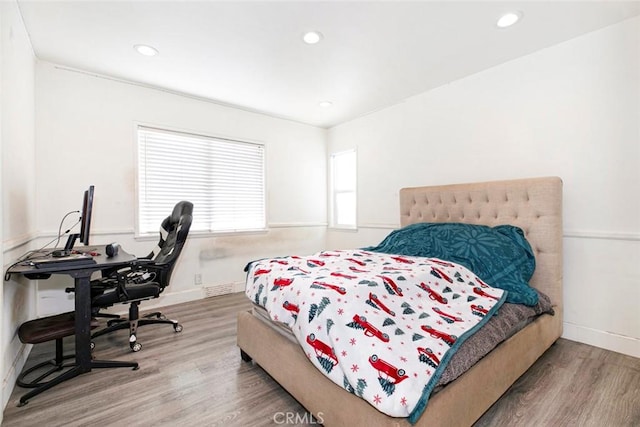 bedroom featuring hardwood / wood-style floors