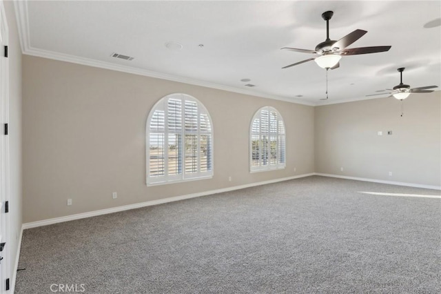 unfurnished room with ceiling fan, ornamental molding, and carpet flooring