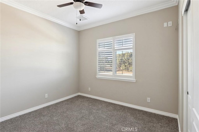 unfurnished room with carpet, ceiling fan, and ornamental molding