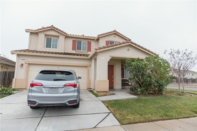 mediterranean / spanish house featuring concrete driveway, a tile roof, an attached garage, fence, and stucco siding