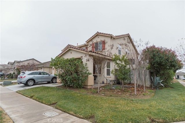 view of front facade with a front yard