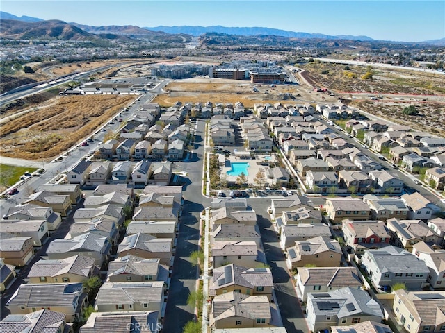 birds eye view of property featuring a mountain view