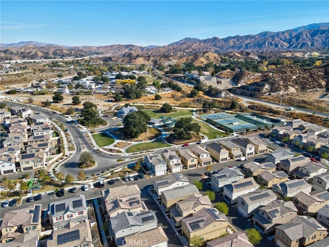 birds eye view of property featuring a mountain view