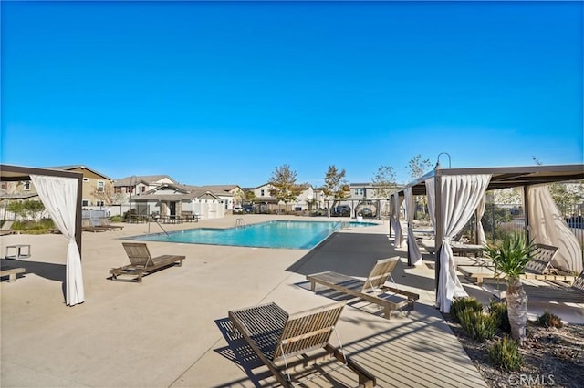 view of pool with a gazebo and a patio area