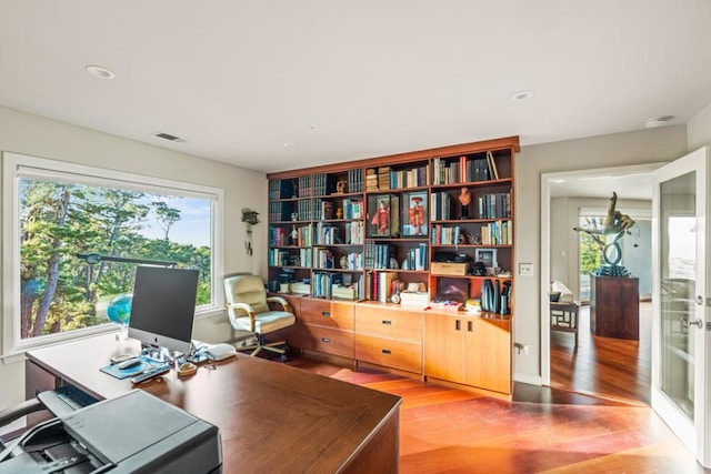 office area with hardwood / wood-style flooring