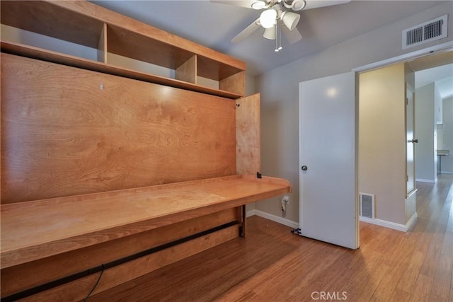 mudroom featuring ceiling fan, lofted ceiling, and light hardwood / wood-style floors