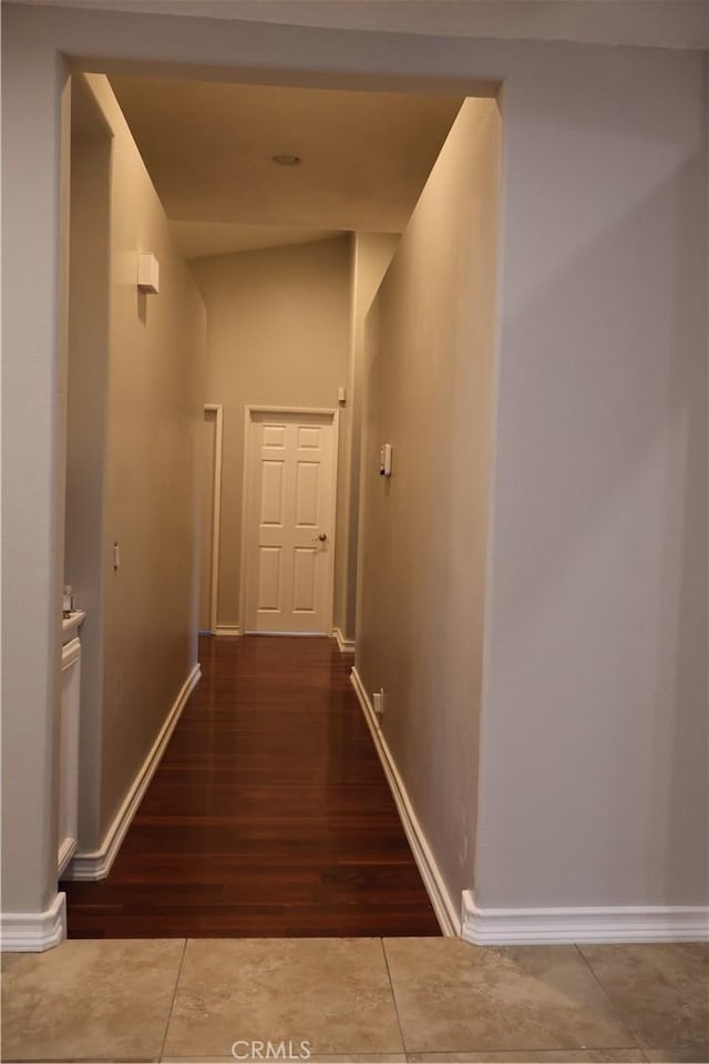 hallway featuring tile patterned floors