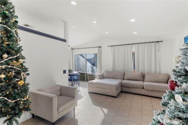 tiled living room featuring lofted ceiling