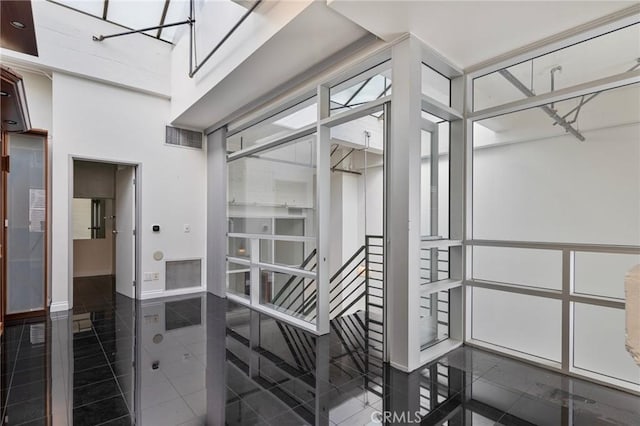 interior space with tile patterned floors