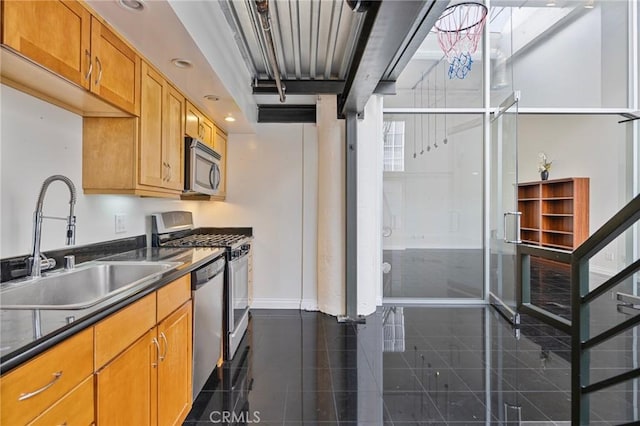 kitchen featuring a notable chandelier, appliances with stainless steel finishes, and sink