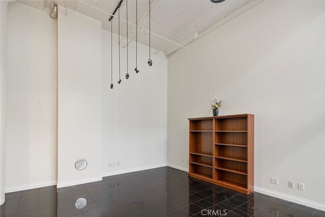 interior space with dark tile patterned floors