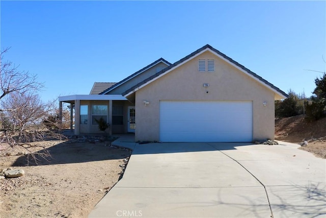 single story home featuring a garage