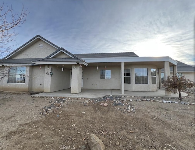 view of front of home with a patio