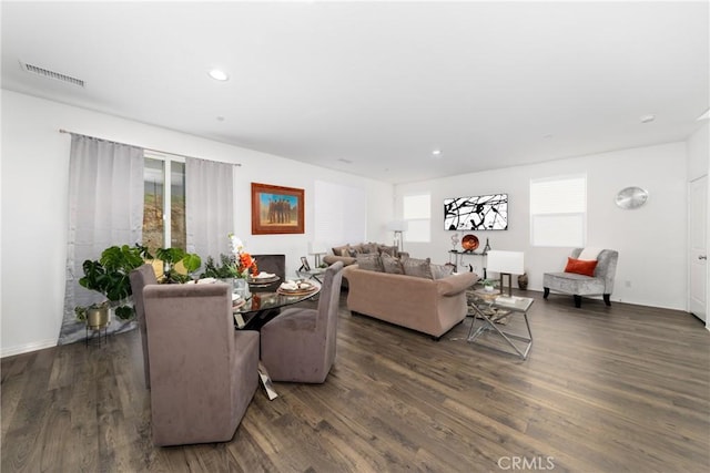 living room with dark hardwood / wood-style floors